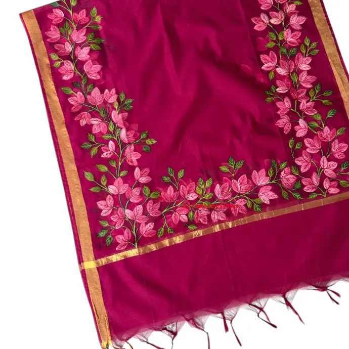 Exquisite hand-painted kurta with botanical motifs, matched with a framed chanderi dupatta in earthy elegance.