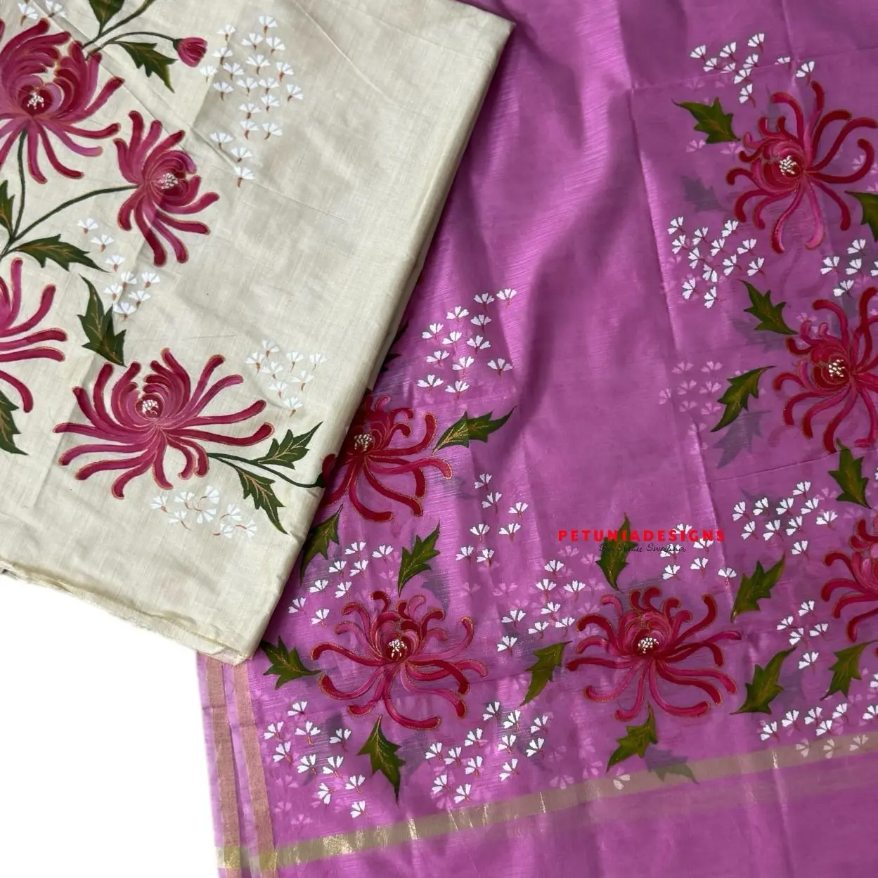 Elegant floral design on Tussar silk set Elegant kurta and dupatta set with floral design and tissue border